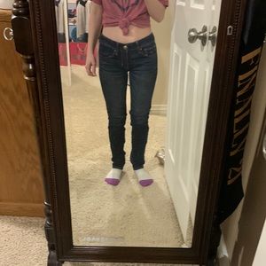 Dark blue skinny jeans from American Eagle Outfitters. Super stretch. Size 00.